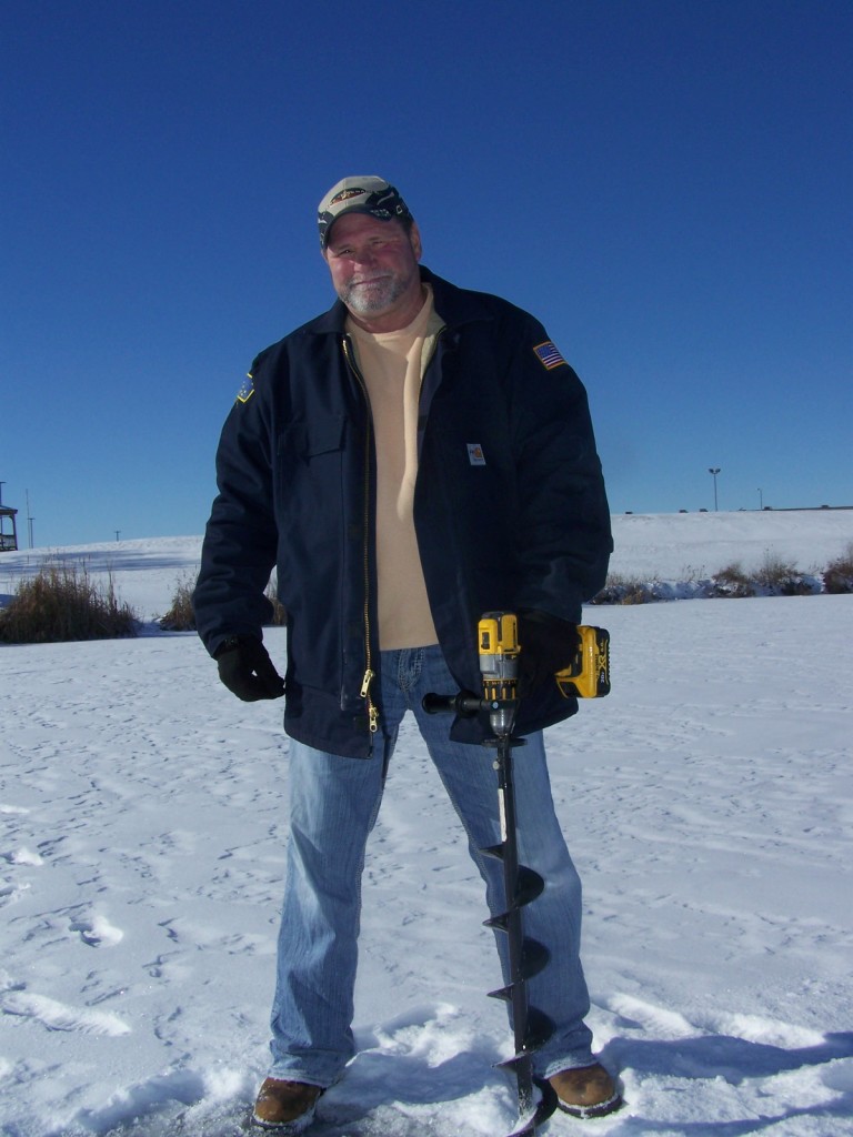 Jeff Hayward is seen checking the ice thickness on Swan Lake in preparation for the annual Heartland Acres Ice Fishing Derby to be held Sunday, Feb. 11. Attendees as well as the public are invited out for the Lions Club Brunch which will run from 8AM to noon. 